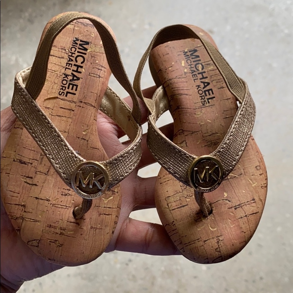 MK gold sandals